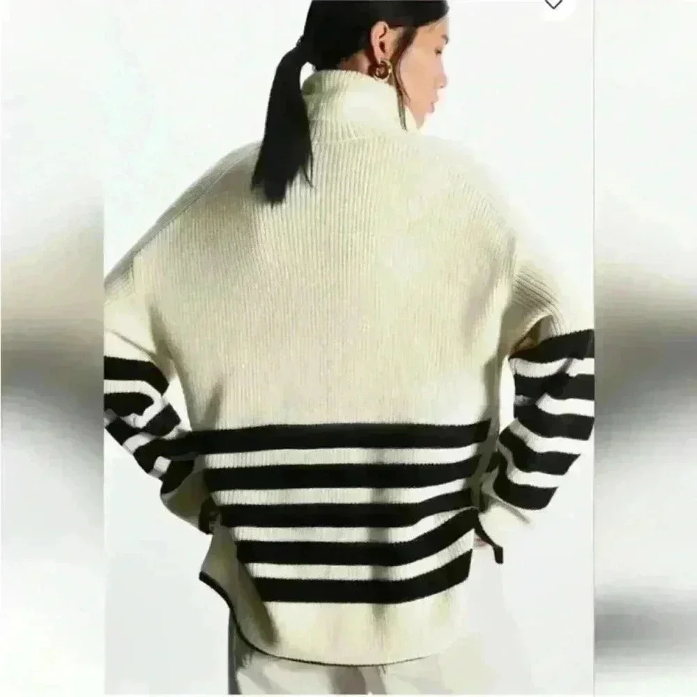 COS Roll neck sweater in white and black striped wool and cotton blend